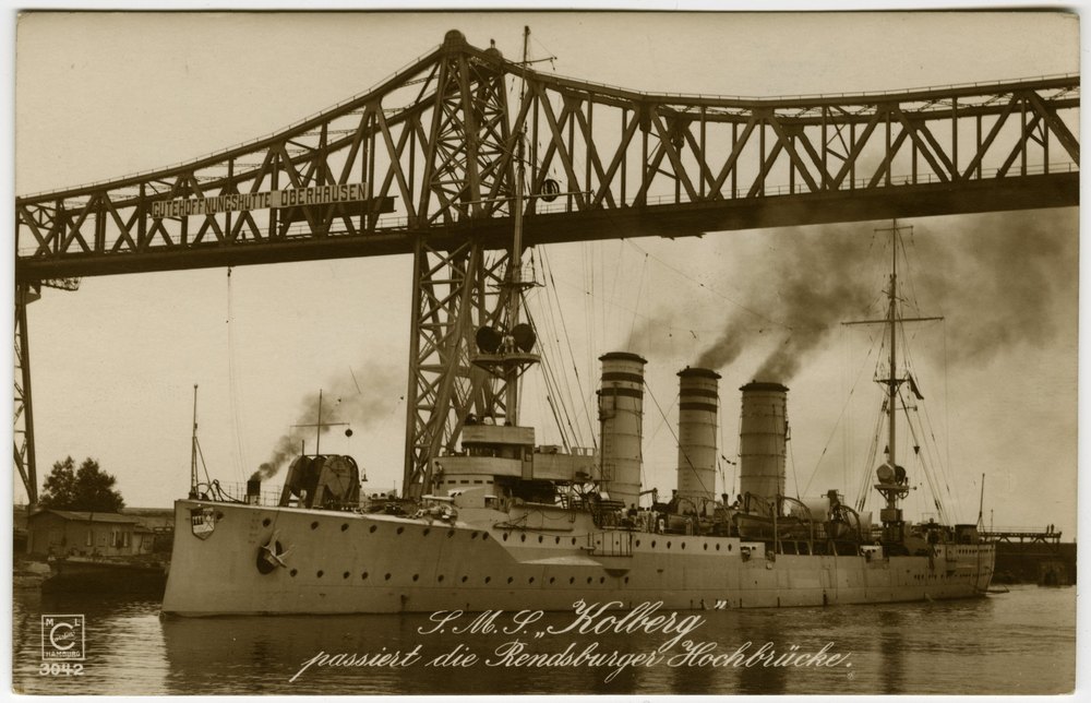 SMS Kolberg passing the Rendsburg high bridge