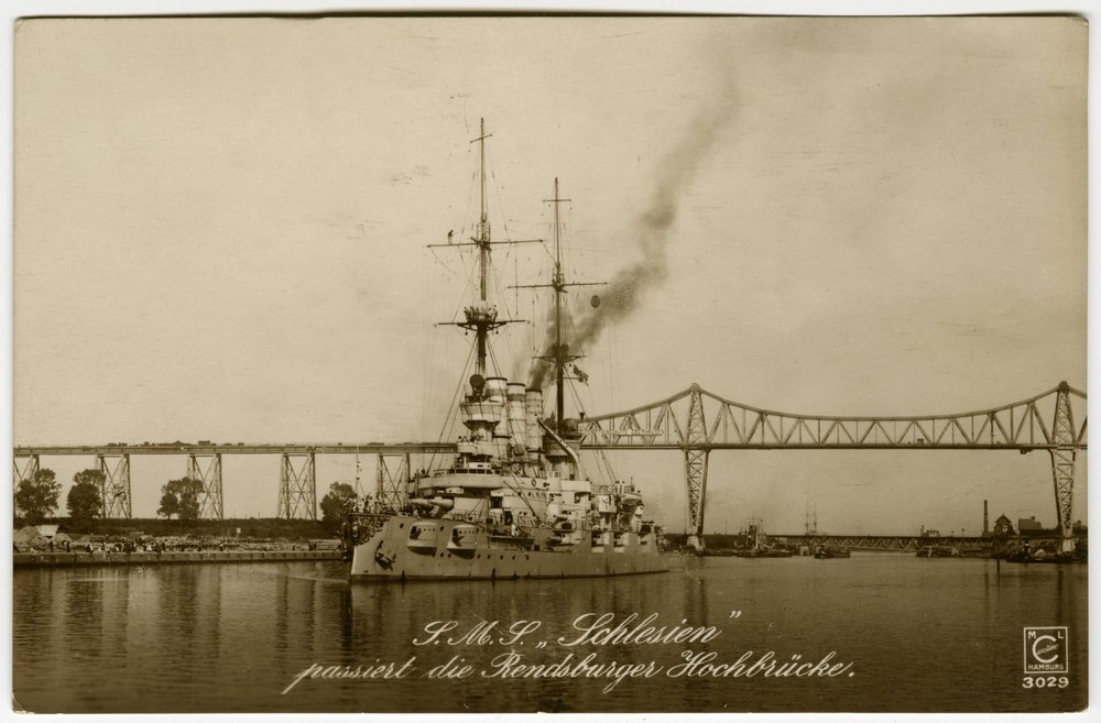 SMS Schlesien passing the Rendsburg high bridge