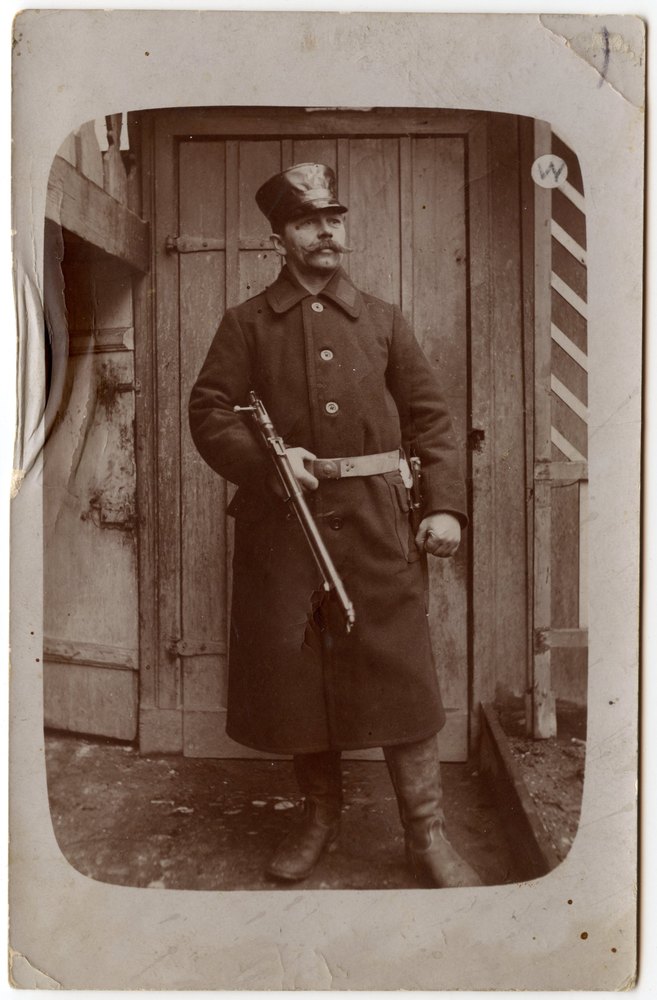 Soldier in uniform with rifle