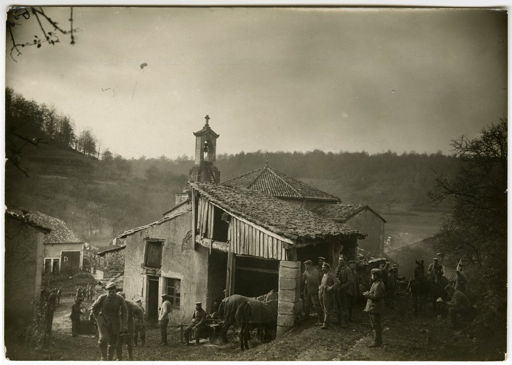 Soldiers in a rural village using a church as quarters