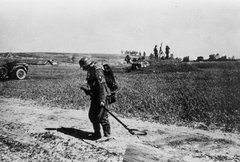 Soldiers searching for mines