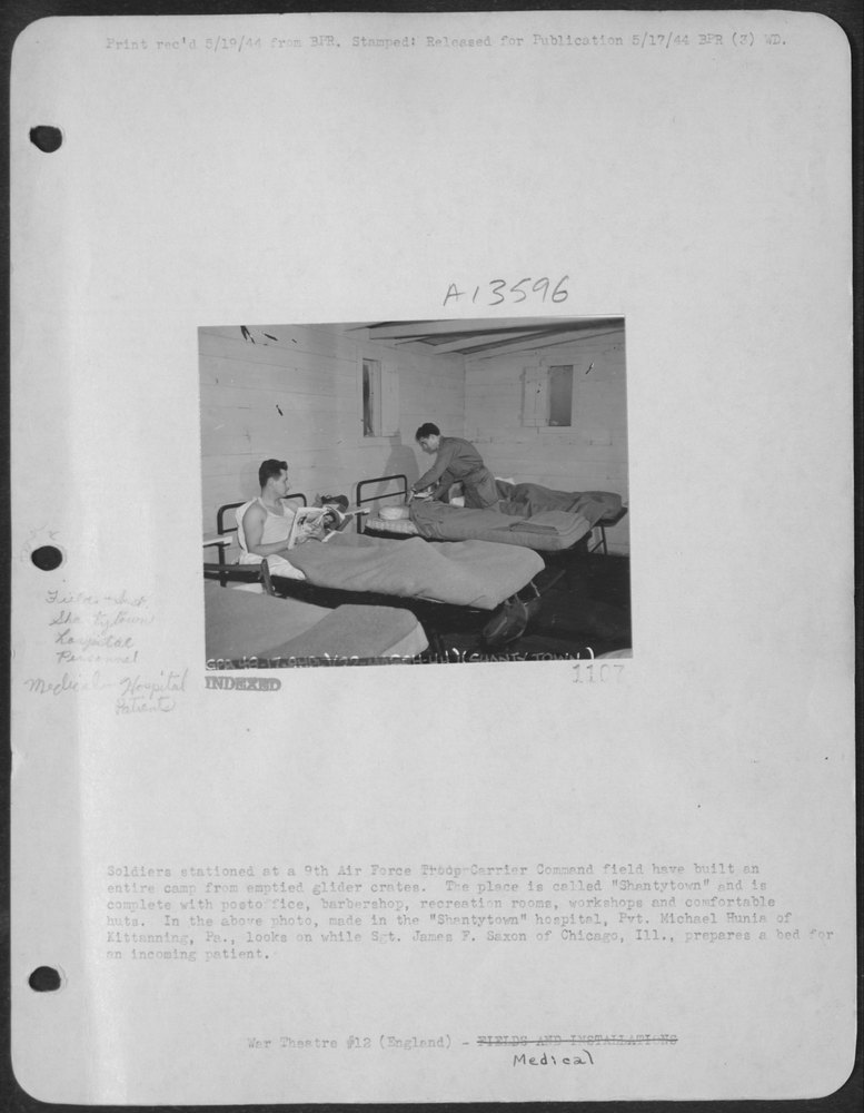 Soldiers stationed at a 9th Air Force Troop Carrier Command field