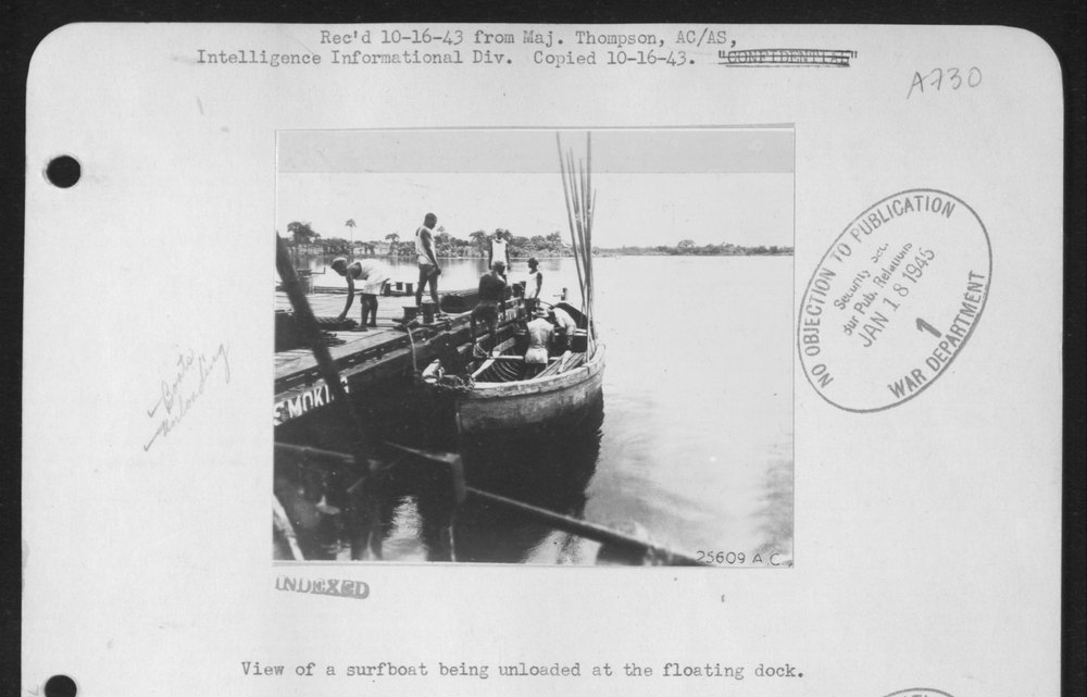 Surfboat at floating dock
