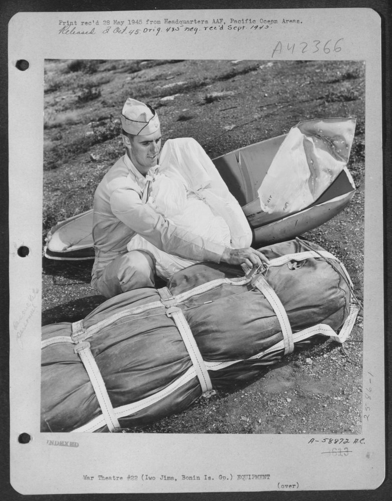 Tapp examines rescue kit on Iwo Jima