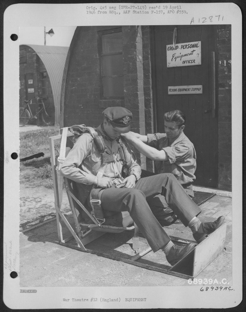 Technician checks pilot harness in England