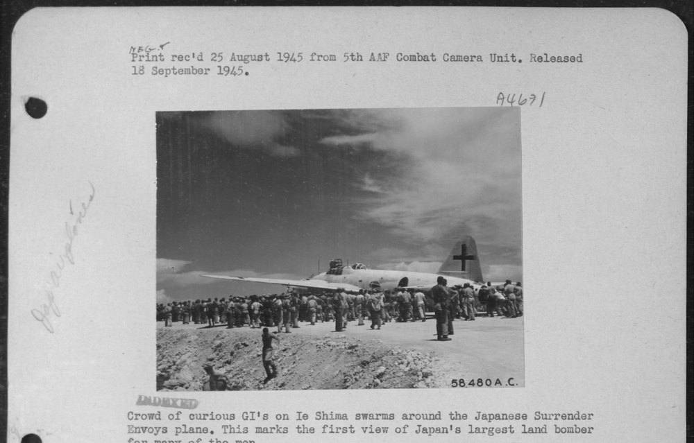 Crowd of Curious Gi's on Ie Shima Swarms Around the Japanese Surrender