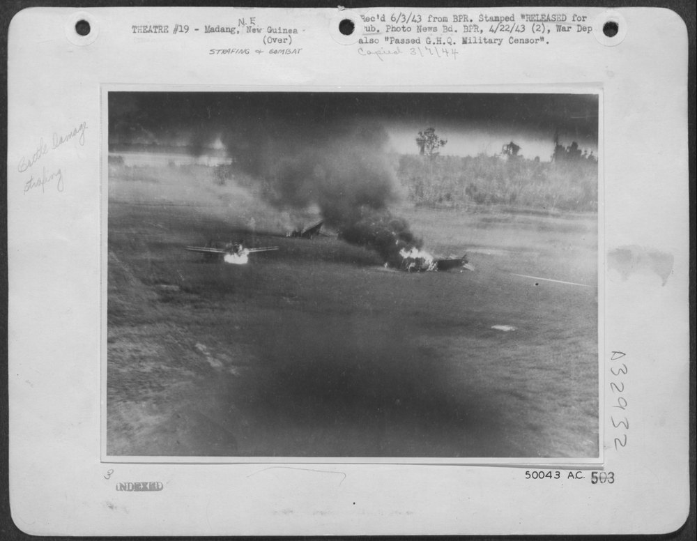 Japanese Aircraft Blazing on Madang Airdrome During Friday's, April 9