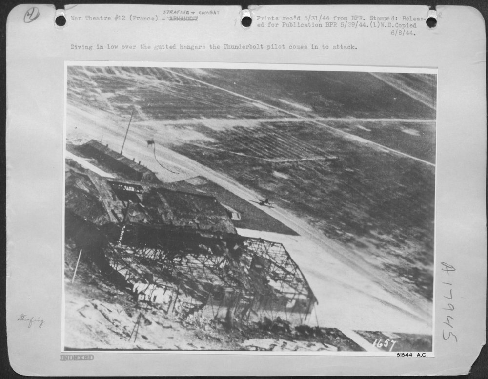 Thunderbolt pilot over gutted hangars
