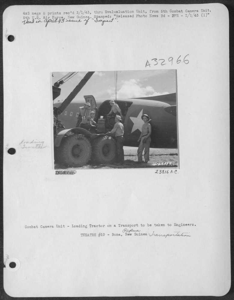Tractor loaded on Transport