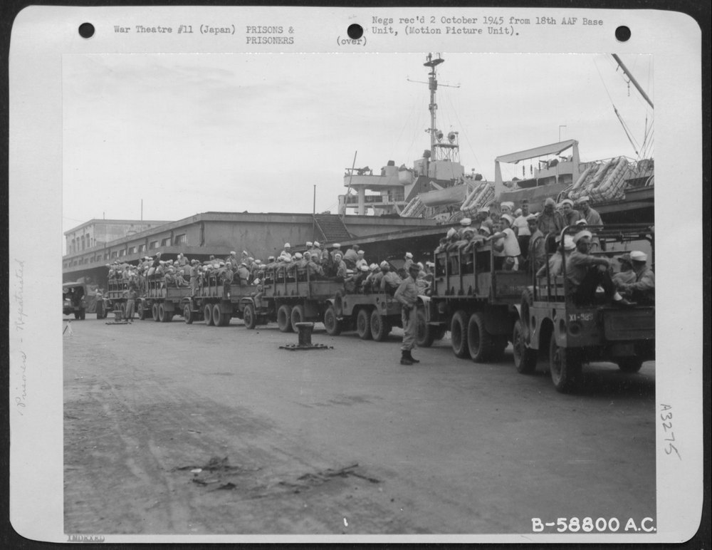 Trucks In Yokohama, Japan, Loaded With Released Prisoners Of War