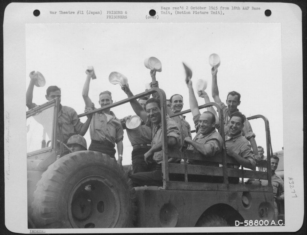 Trucks In Yokohama, Japan, Loaded With Released Prisoners Of War