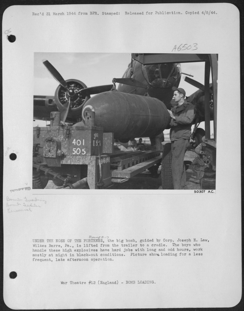 UNDER THE NOSE OF THE ofRTRESS, the big bomb, guided by Corp