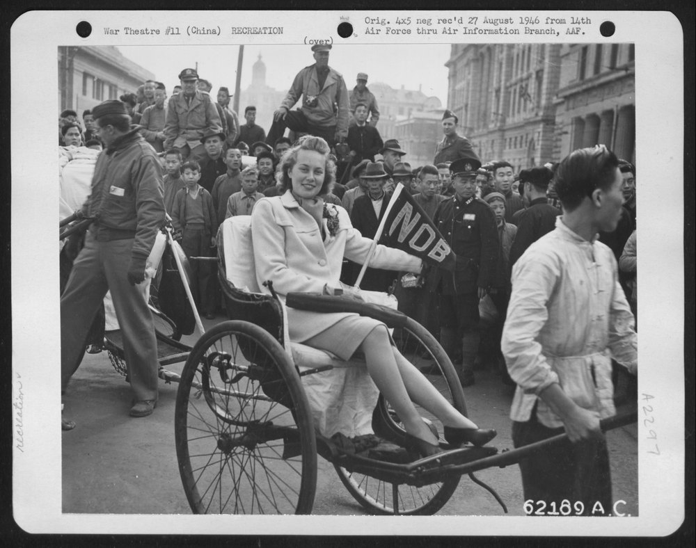 US Personnel in China Ricksha Race