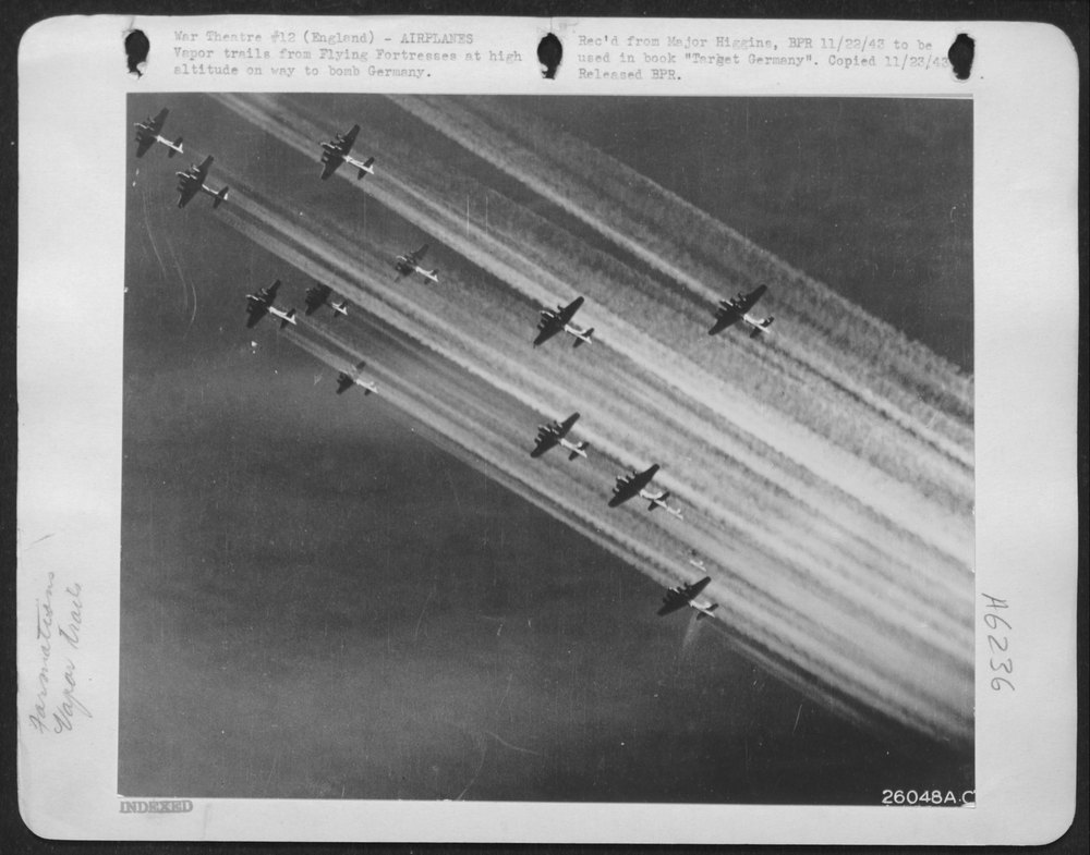 Vapor trails from Flying ofrtresses at high altitude on way to bomb