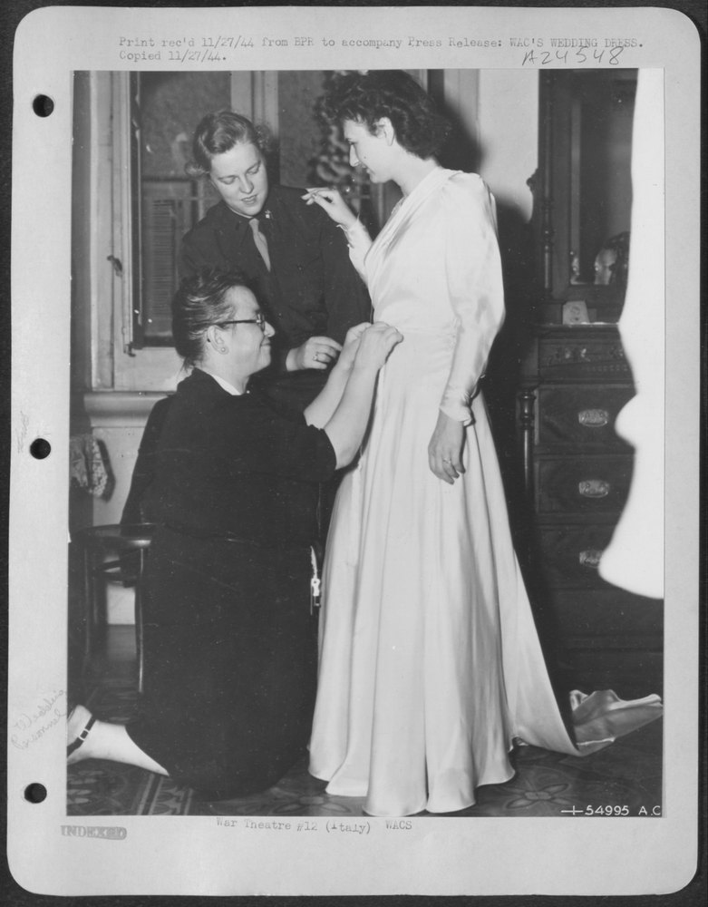 WAC tries on wedding dress in Bari