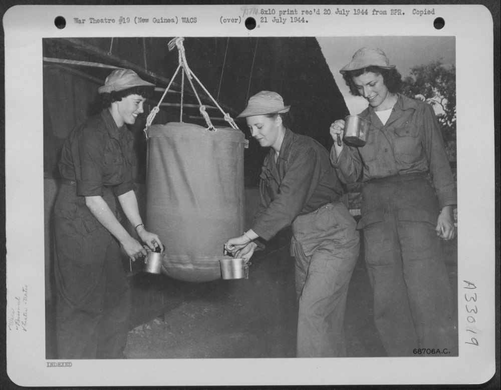 Wacs taste chlorinated water in New Guinea