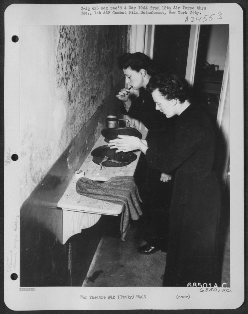 WACs use helmets as basins