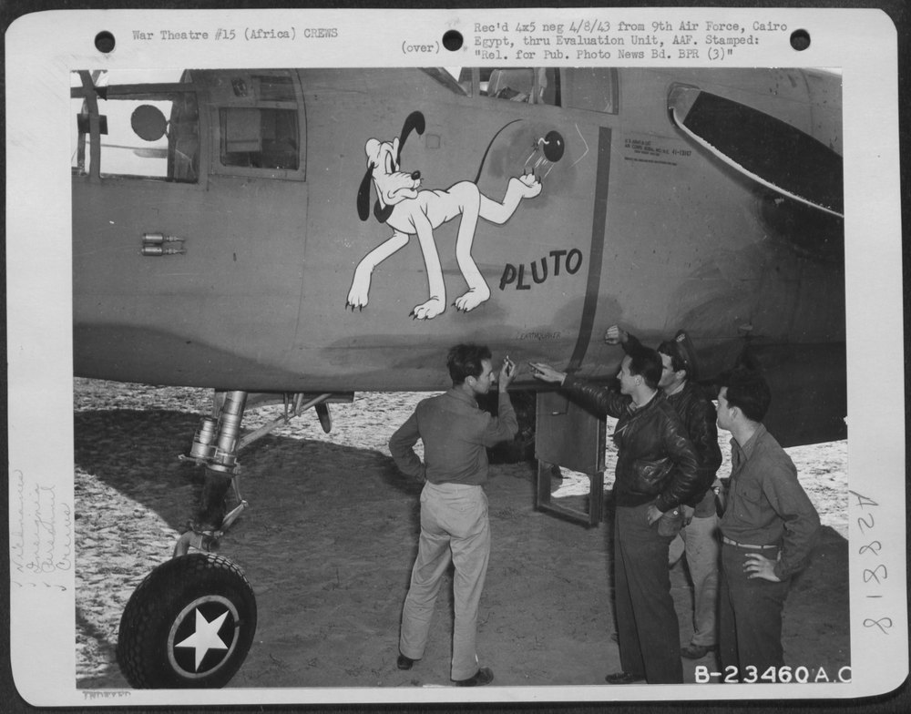 Walt Disney will love this! "Pluto" gets a break as Lt. John J