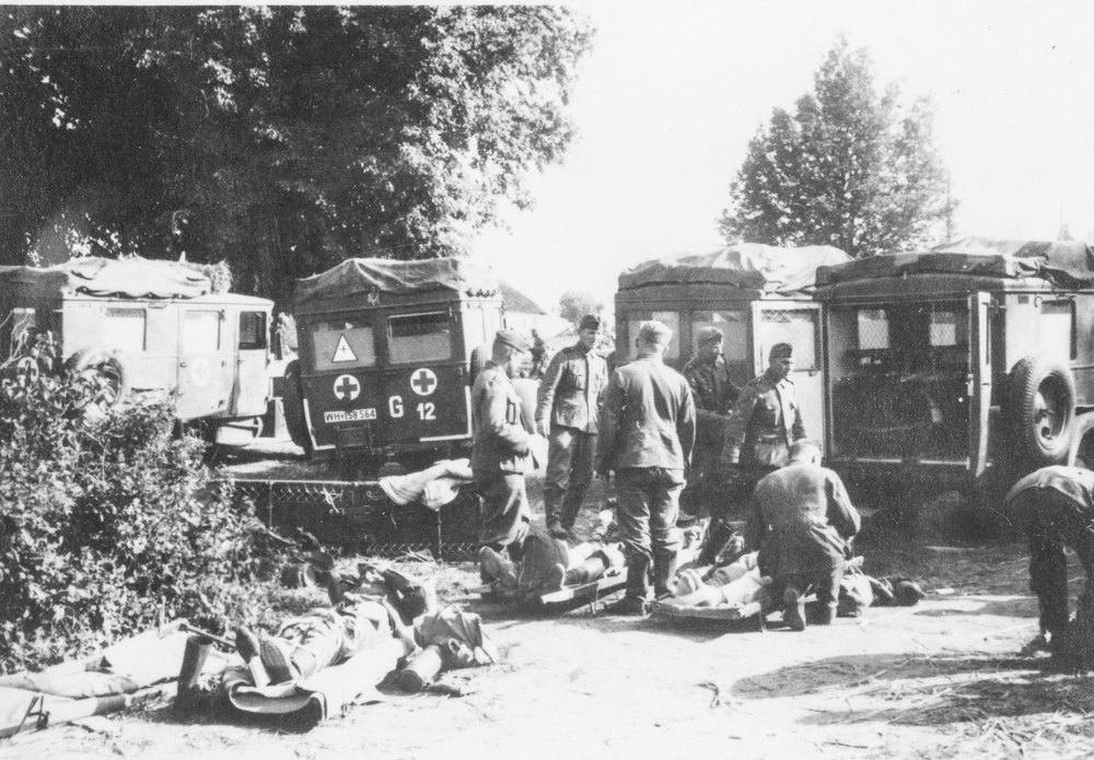 Wounded brought to the rear by ambulances