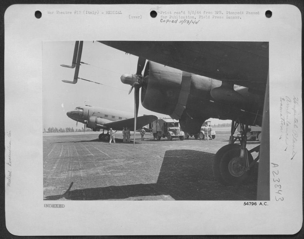 Wounded taken from aircraft in Italy